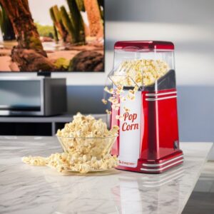 Machine à pop corn compacte et facile à utiliser, idéale pour préparer du pop corn frais en quelques minutes. cadeau homme gourmand pour les soirées cinéma à la maison​​.